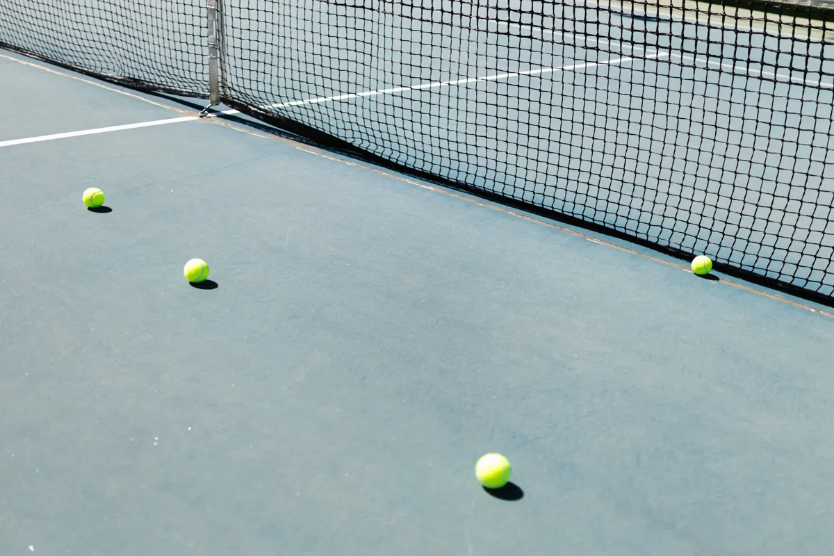 Empty tennis court prepared for a full match recording